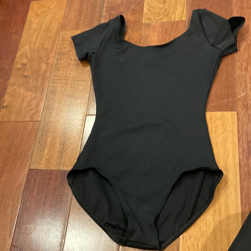 Dance apparel- Woman’s black short sleeve leotard